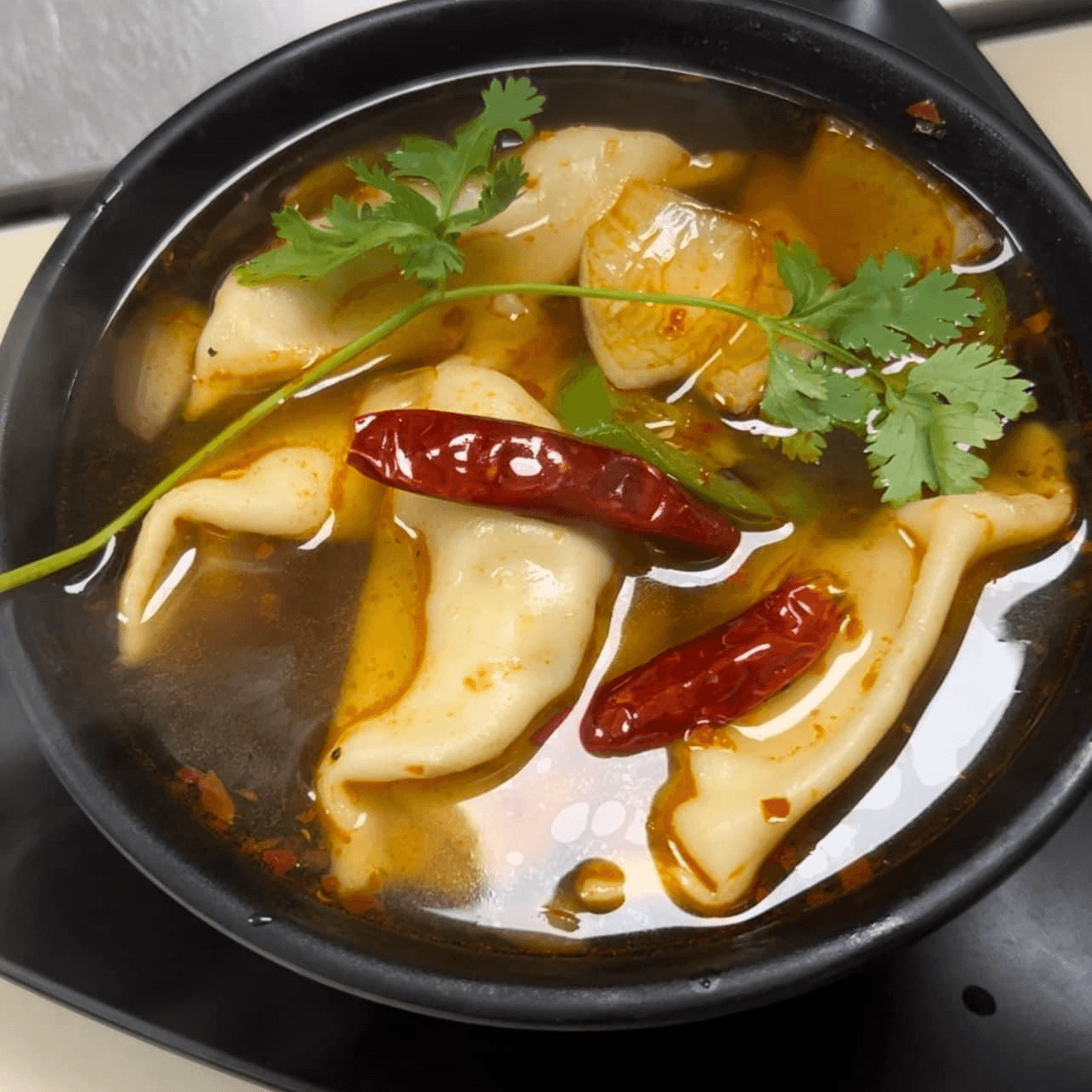 A16. Spicy Dumplings Soup.