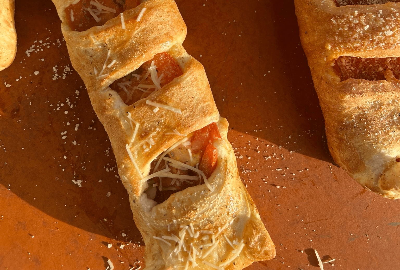 Pesto chicken tomato stuffed cane.