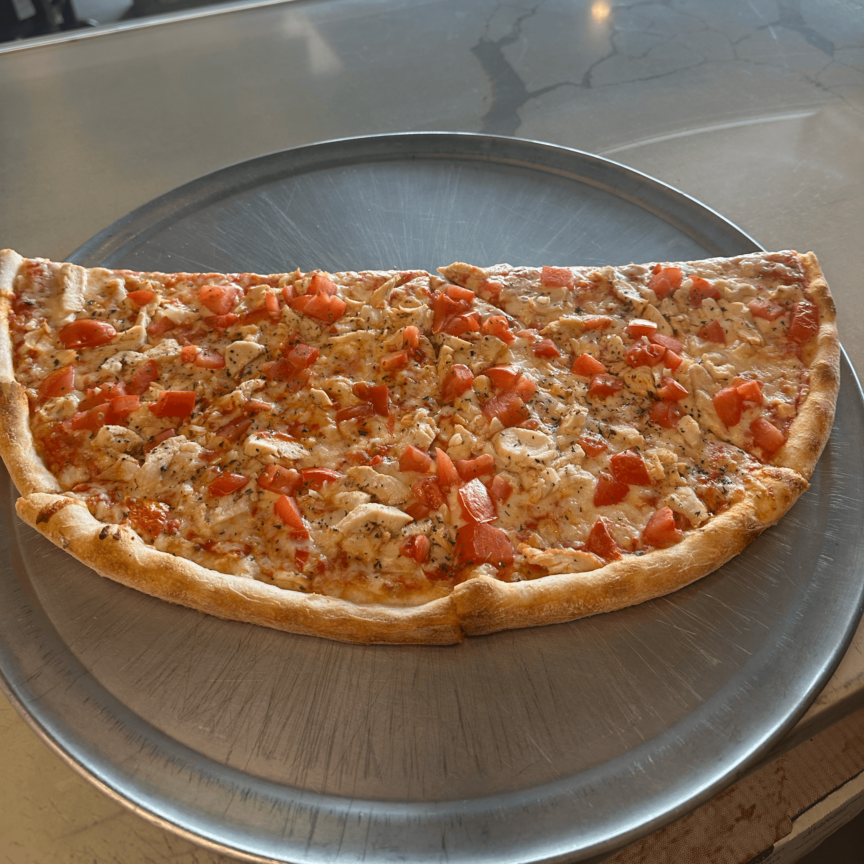 16” Pollo special pizza.