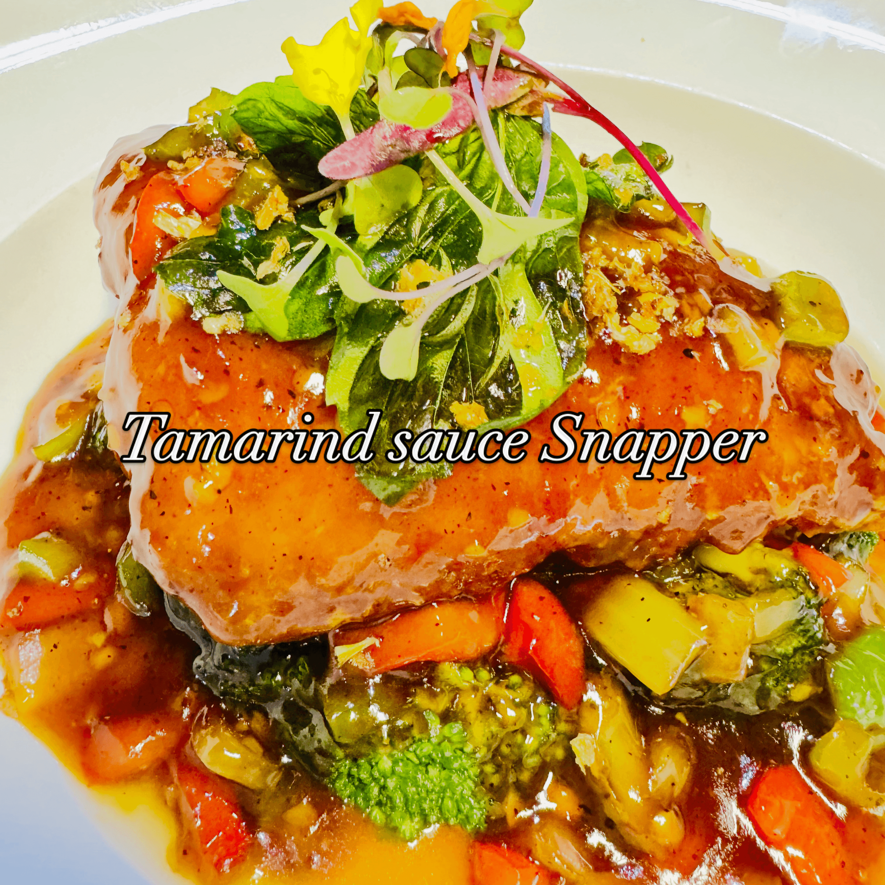 Crispy Red Snapper with Sweet & Sour Tamarind Sauce.
