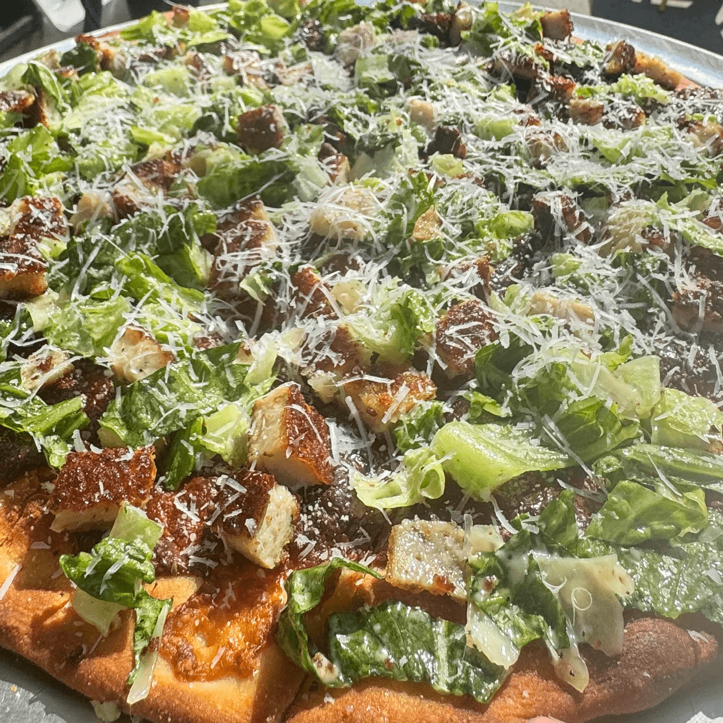 Tavern Chicken Caesar Salad Pizza.