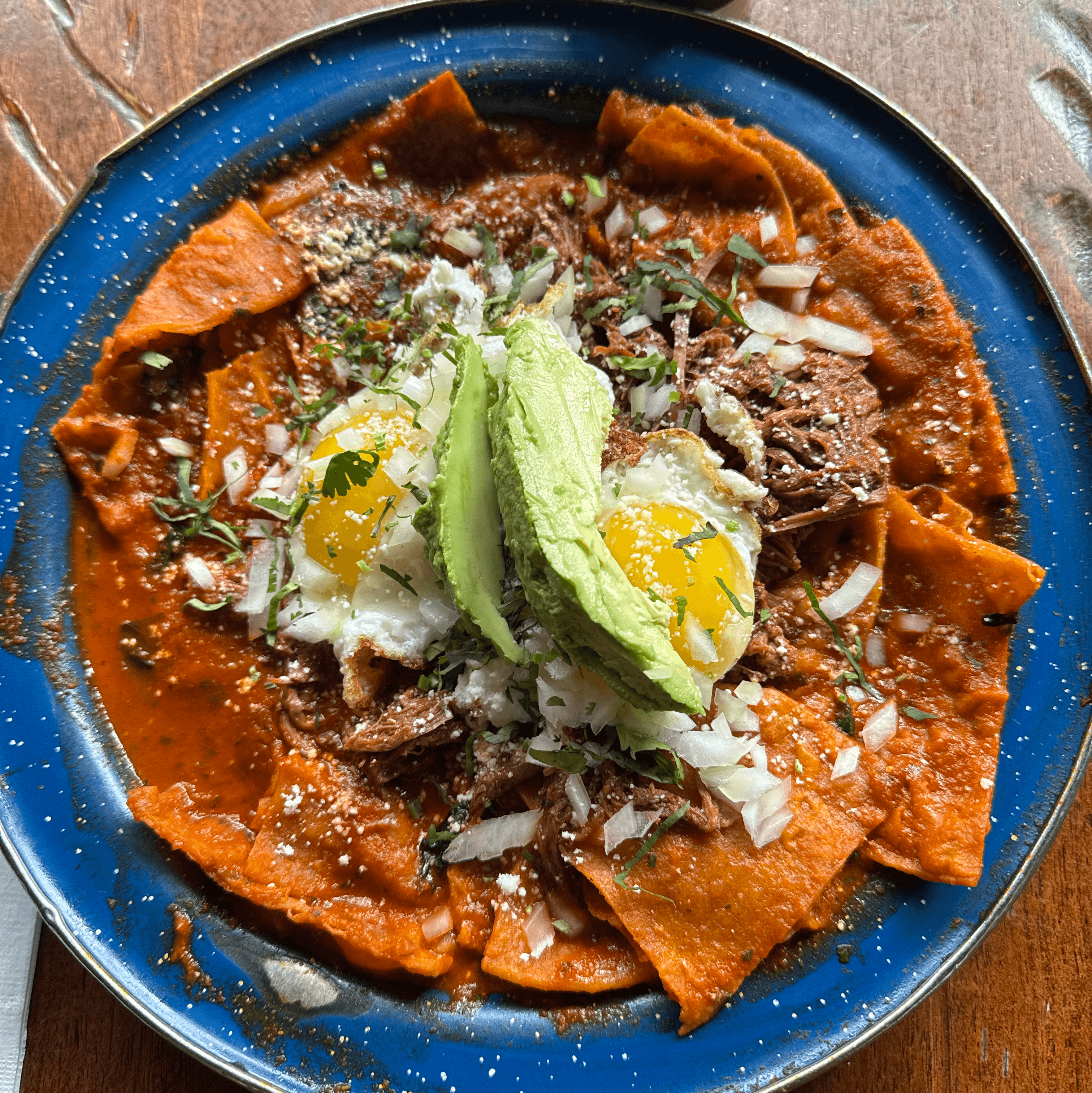 Chilaquiles With Birria And 2 Eggs.