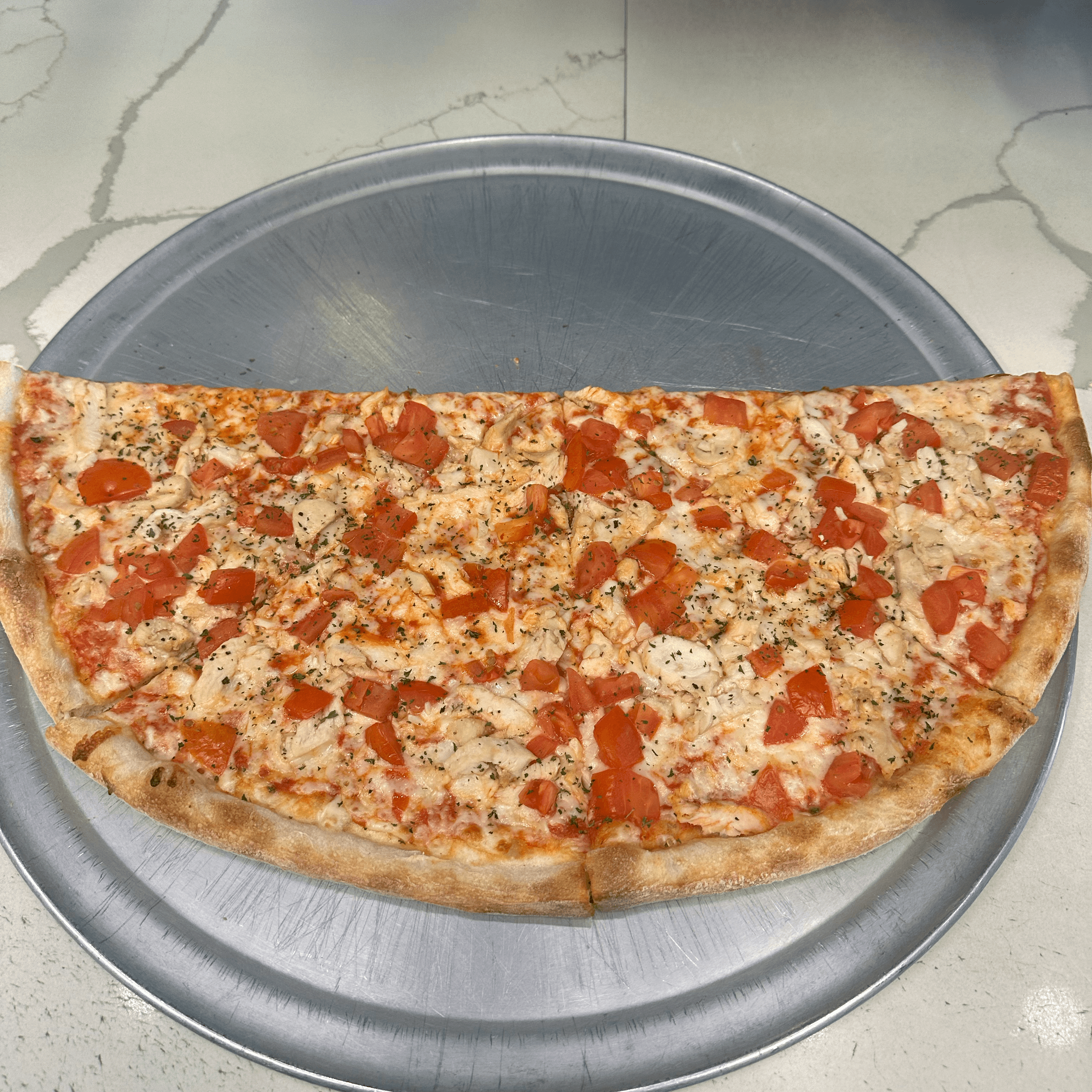 12” Pollo special pizza.