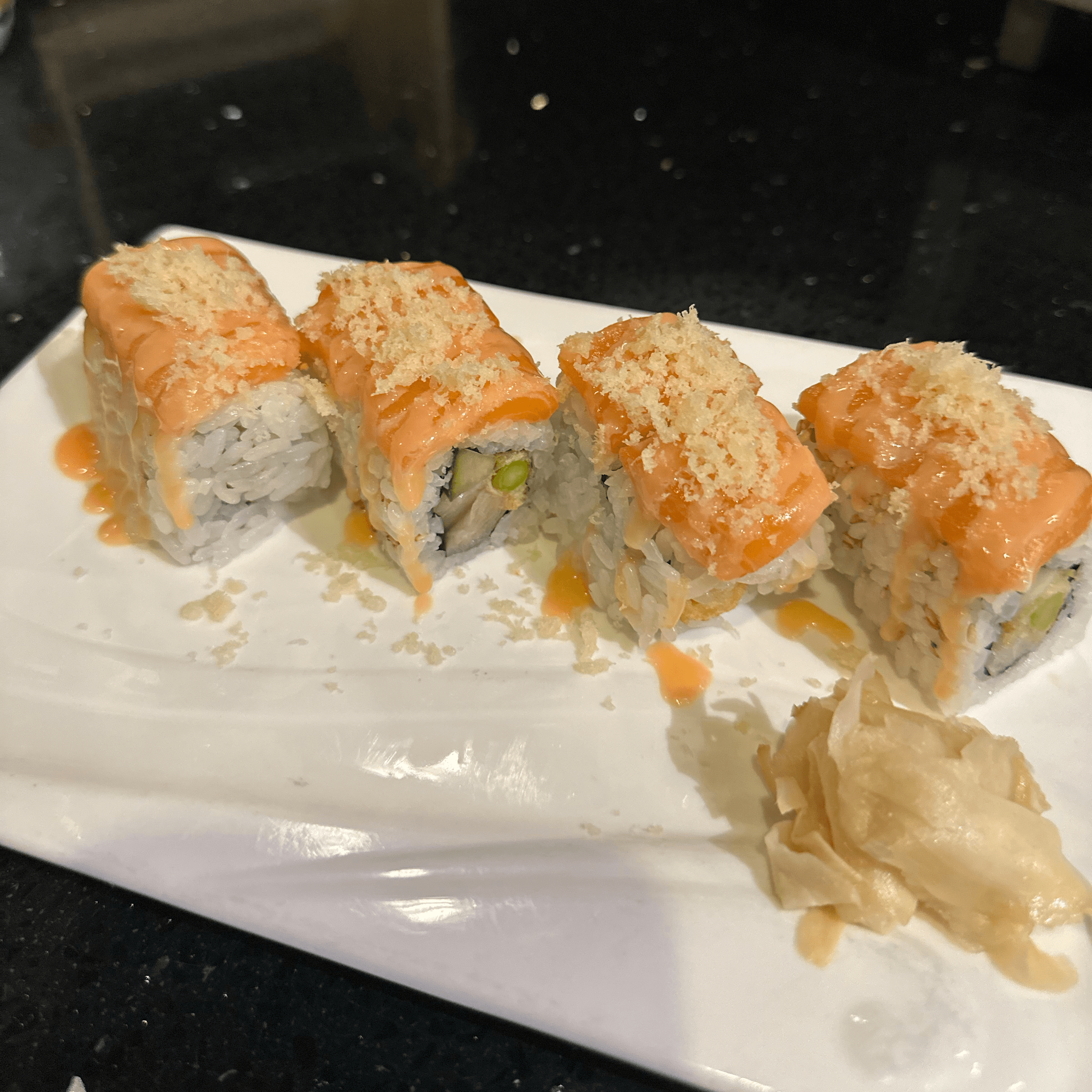 Honey Bunny Roll - Yellowtail, tempura asparagus and cucumber inside,…n, tempura crunchy and special honey sauce on top.