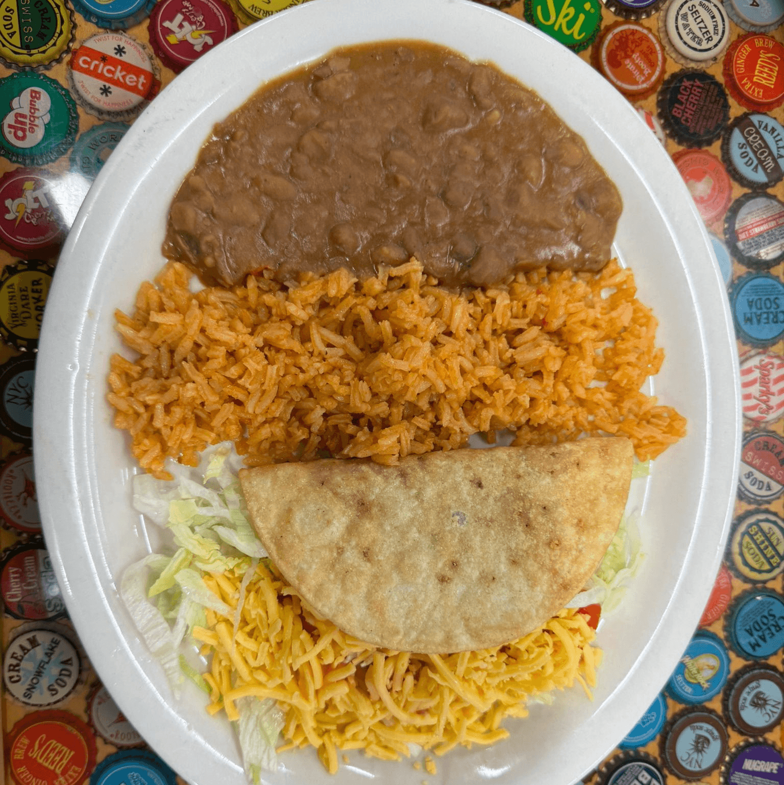 Crispy or Soft Taco with Rice & Beans.