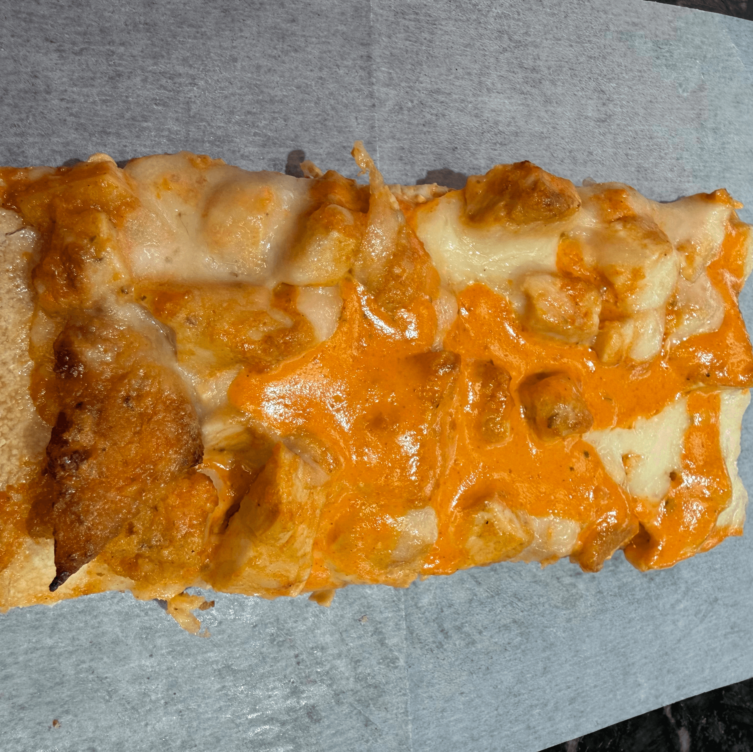 Buffalo Chicken Pizza Slice.