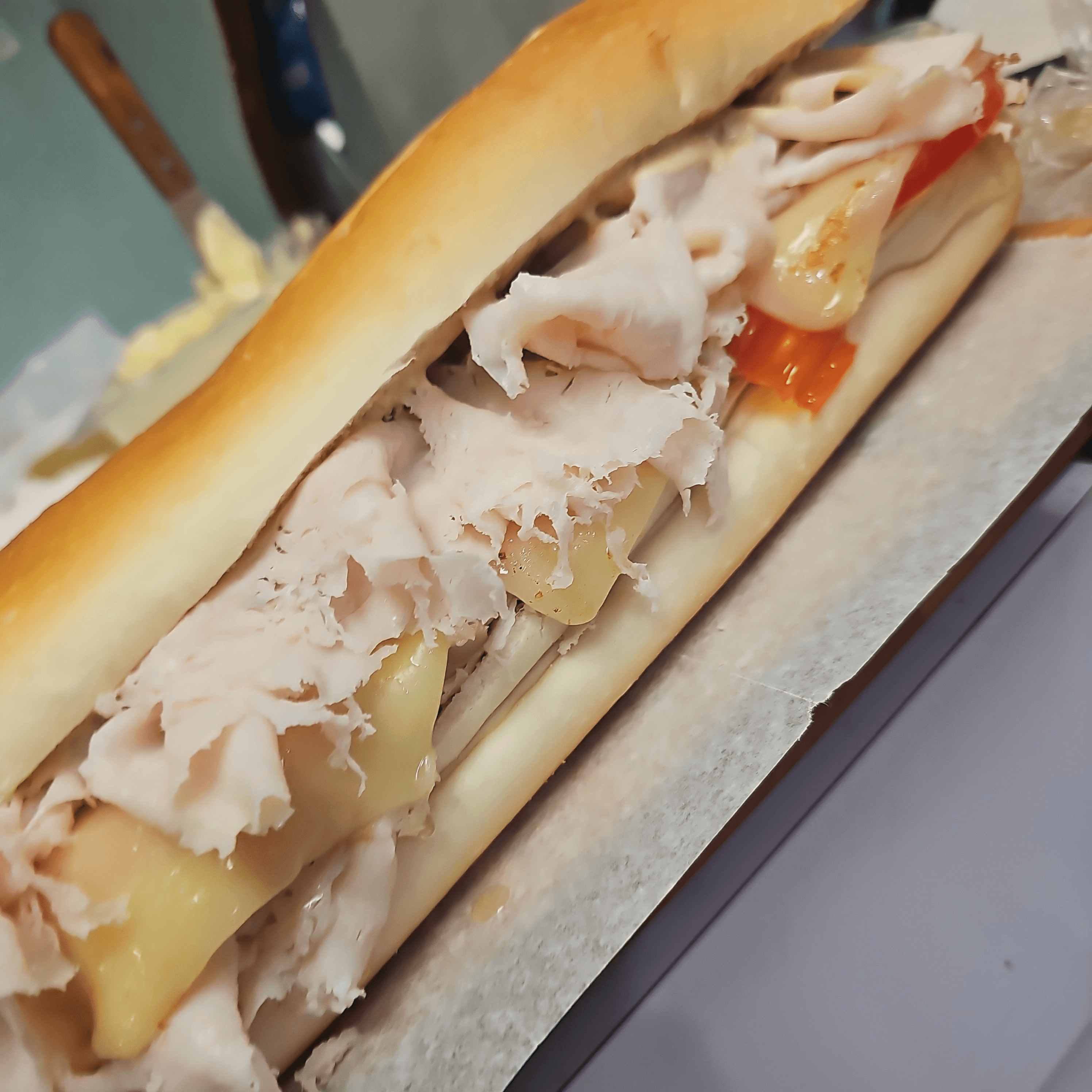 #24 Roasted Turkey Breast, Melted Mozzarella Cheese  Sandwich.