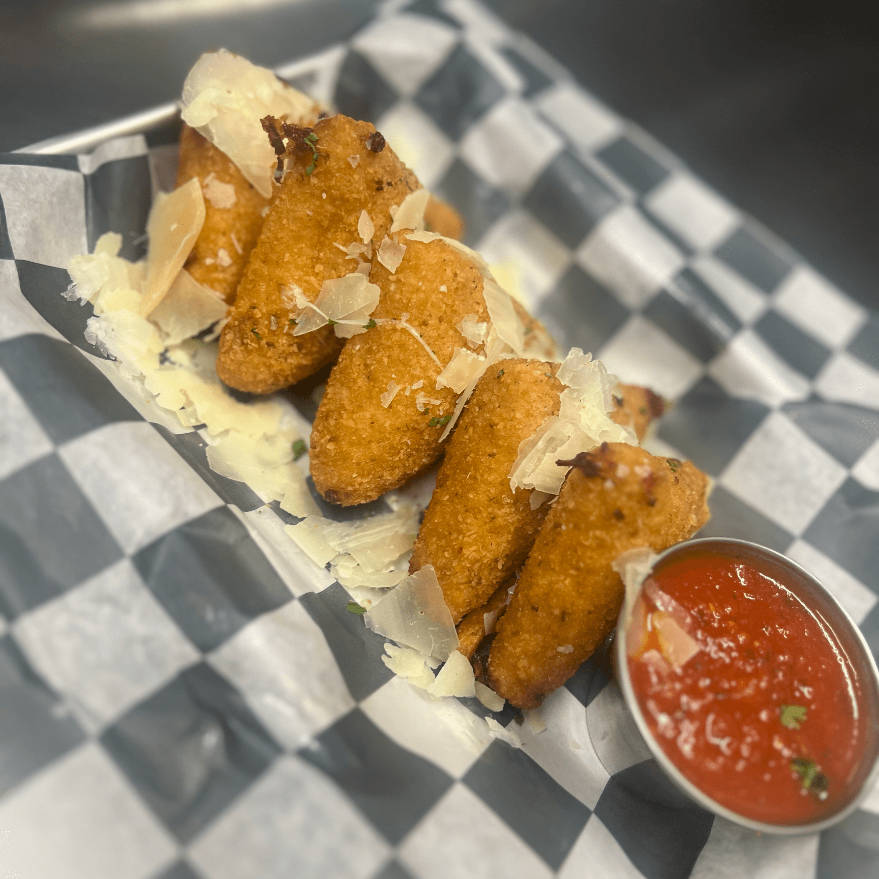 Fried Mozzarella Triangles.