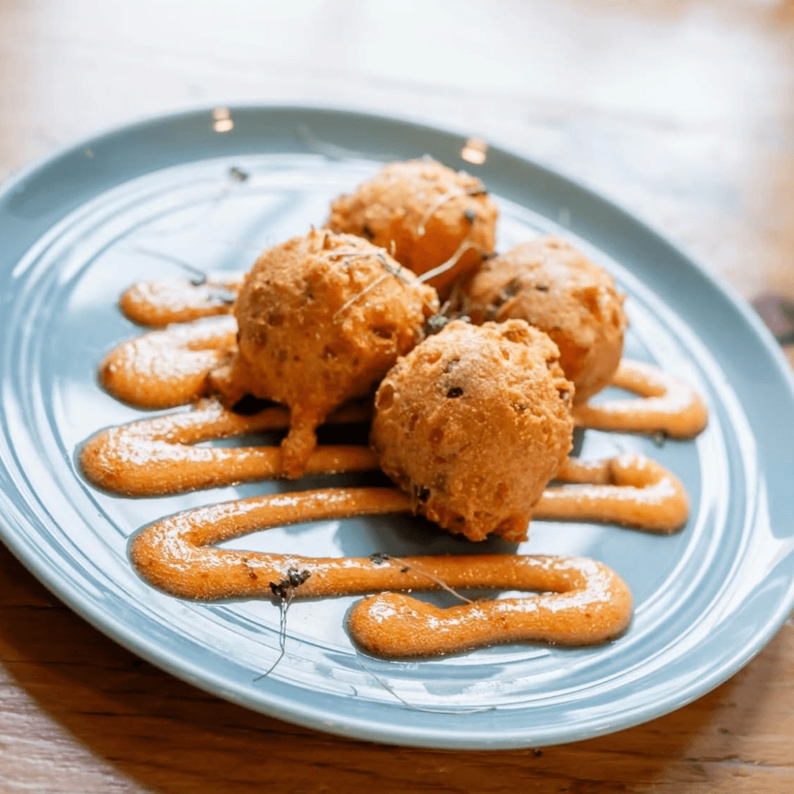 Sweet Potato & Tasso Ham Hush Puppies.