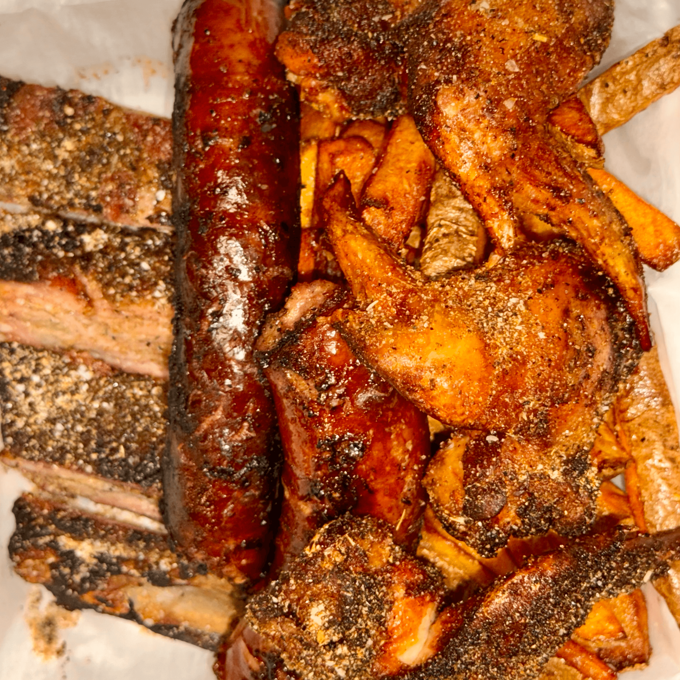 Pork Spare Ribs/Whole Wings/Pork Hot Link & Fries.