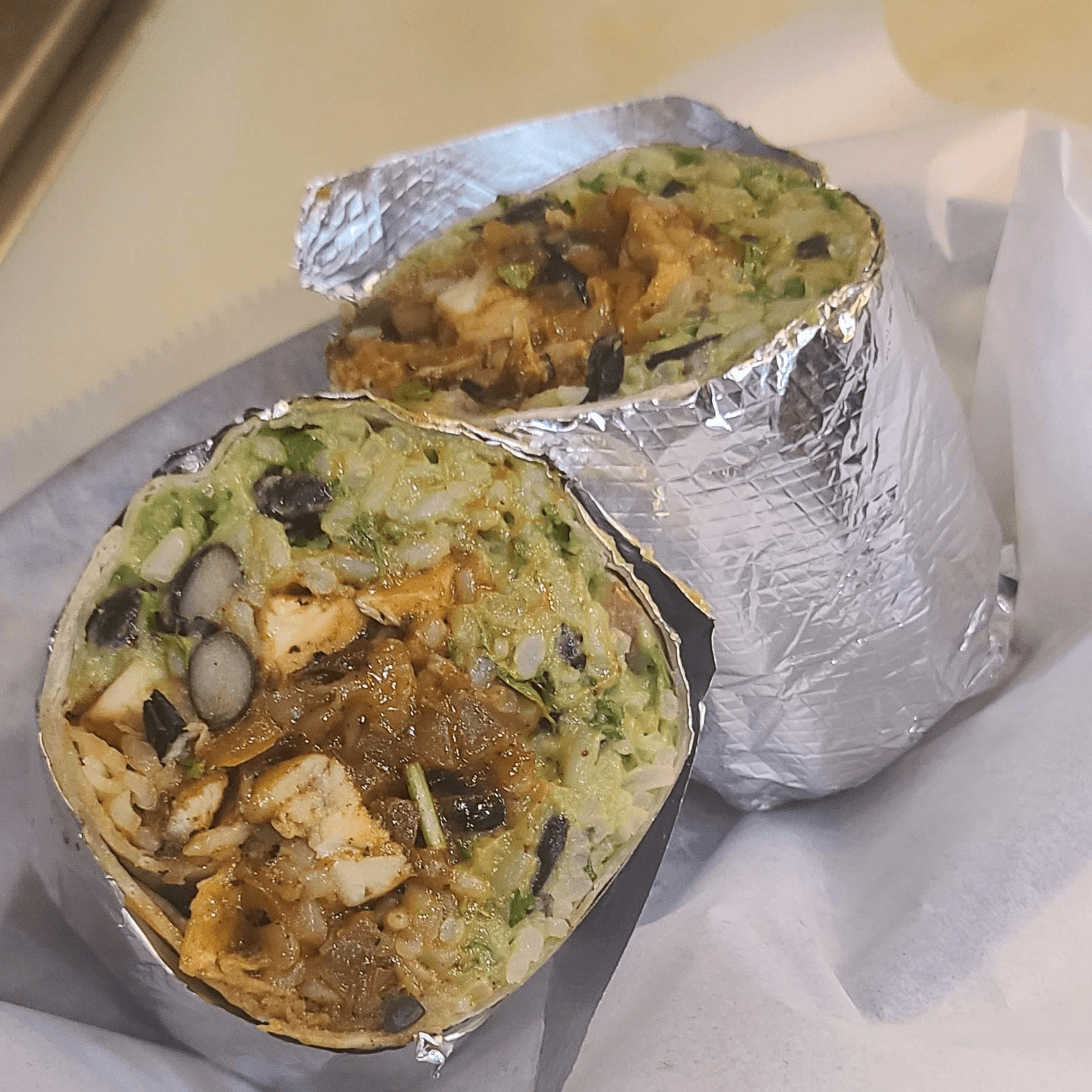 Buy 1 Burrito, Get 1 Half Off.