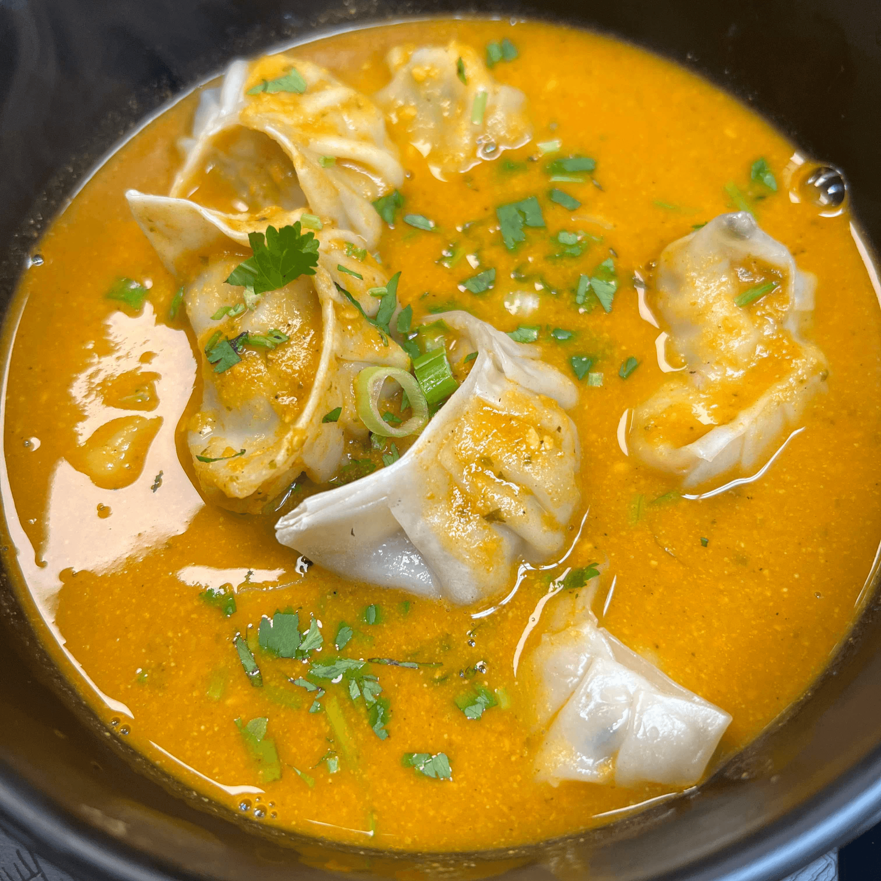 Veg jhol (soup) momo.