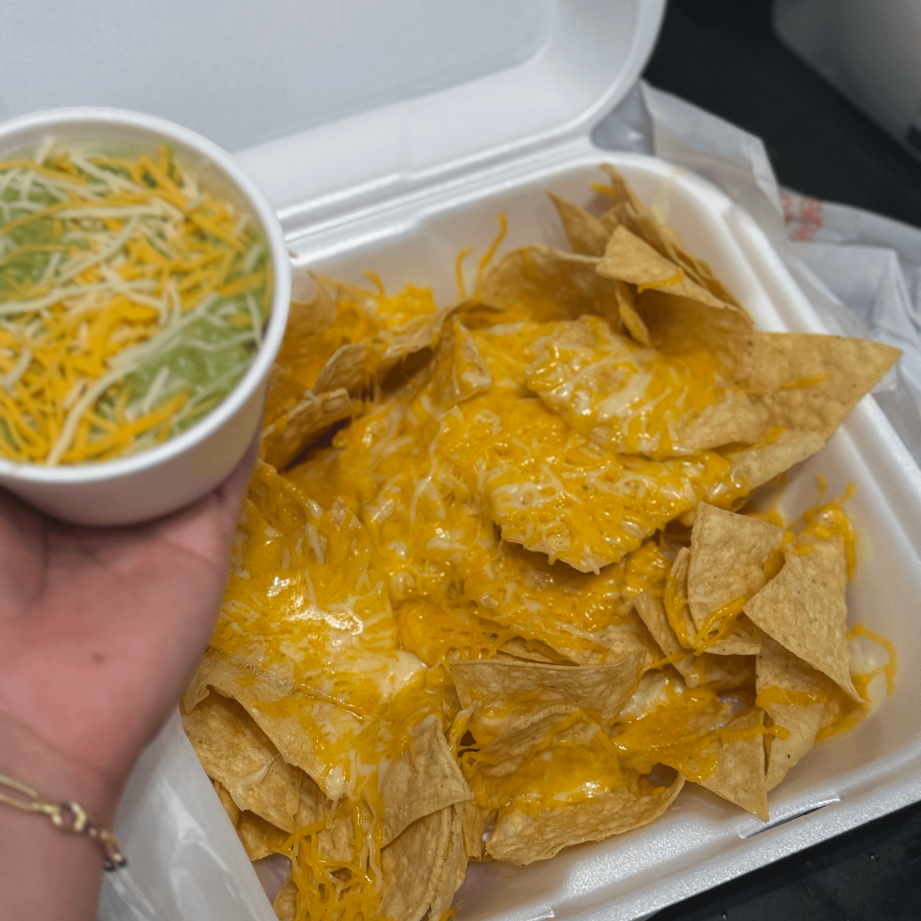 A1 Chips with Guacamole & Shredded Cheese.