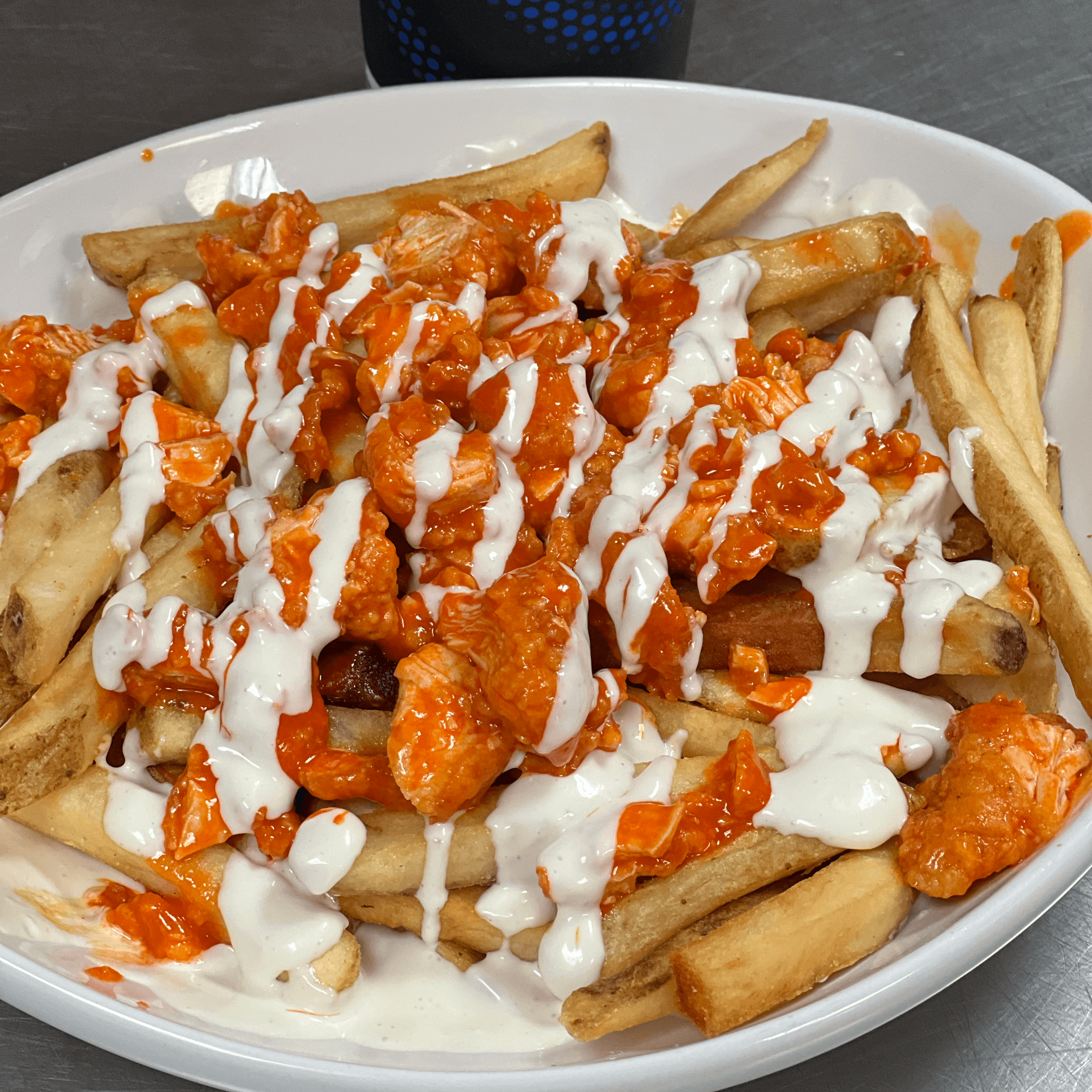 Buffalo fries- With chicken.