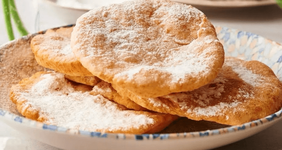Fried Dough with powdered Sugar.
