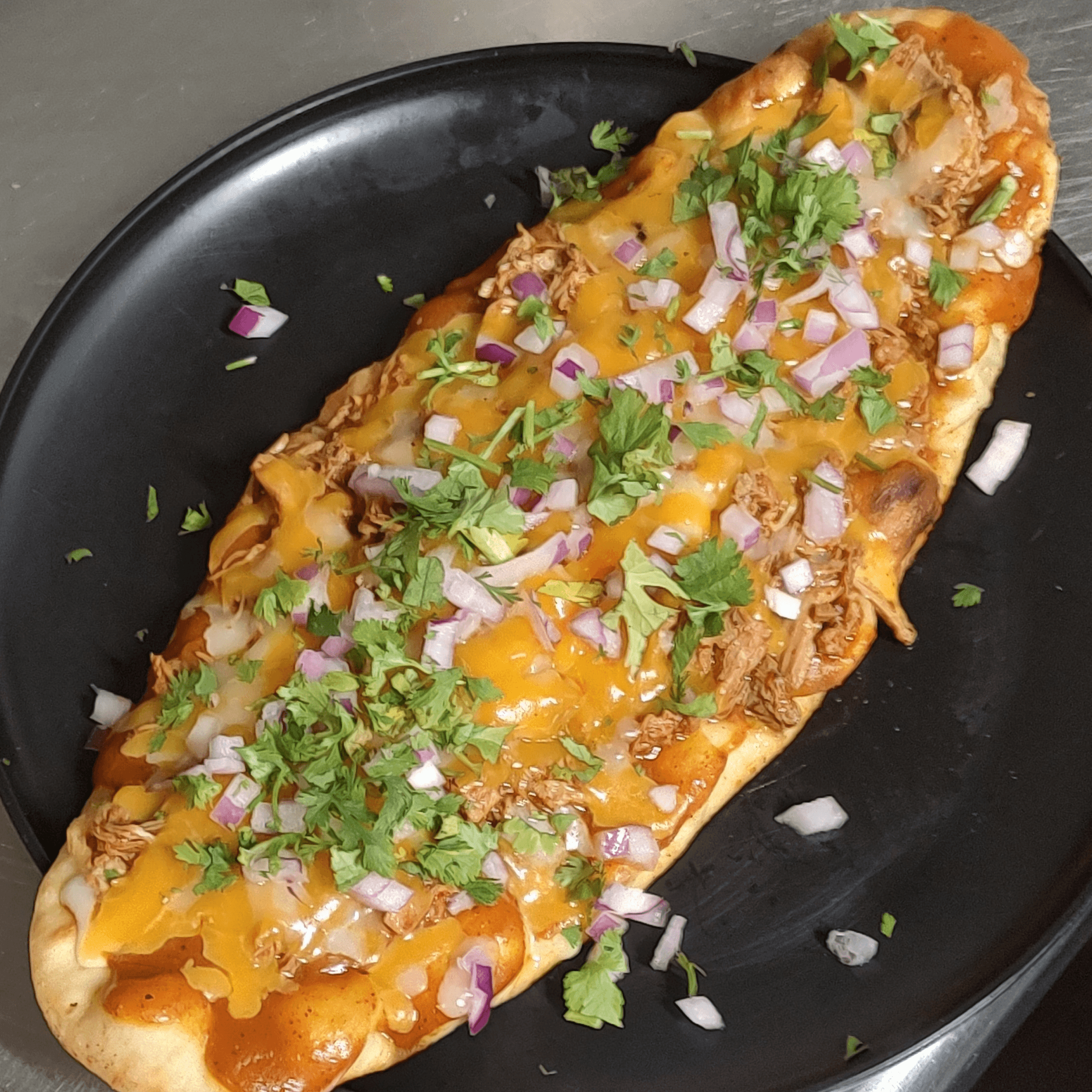 Chicken Birria Flat Bread Pizza.