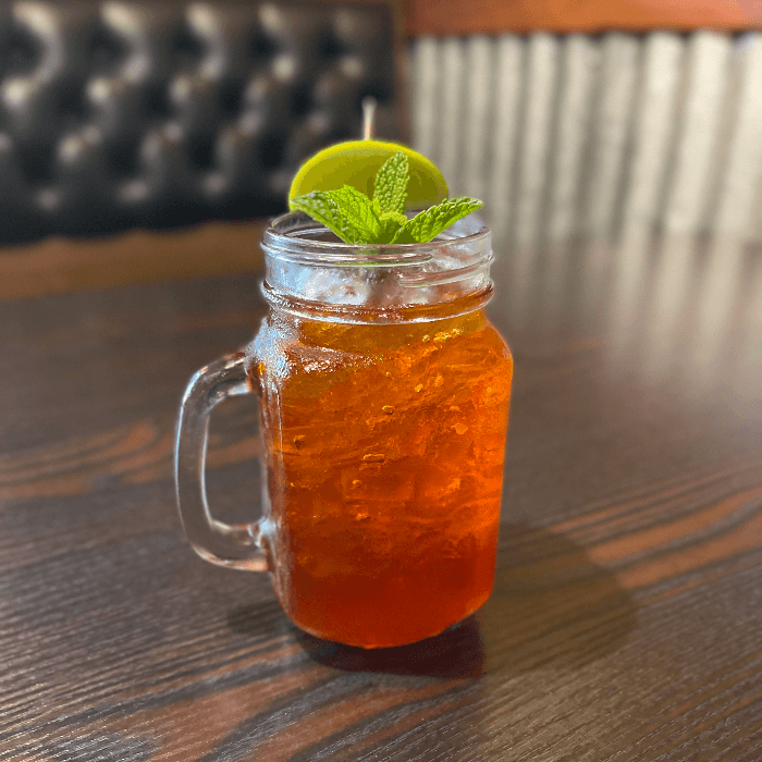 Thai Limed Iced Tea (24 oz).