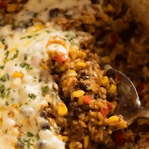 Dos Sopes, Arroz y Frijoles / Two Thick Corn-Filled Patties, Rice and Beans Combination Plato