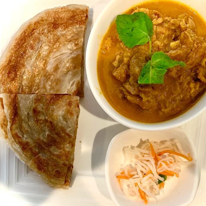3. Paratha with Coconut Chicken Curry