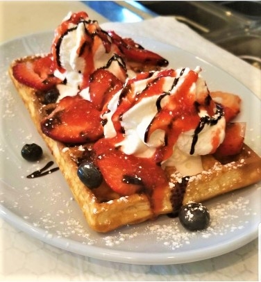 Waffles with Sauce, Fruits and Whipped Cream