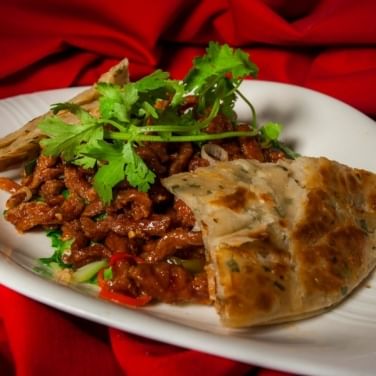 L23. Dry Sautรฉed Beef Szechuan Style.