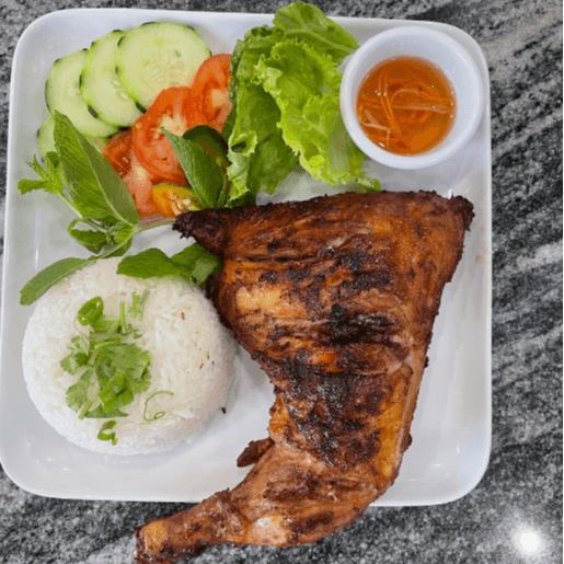 Rice Plate with Fried Quarter Leg Chicken Thigh/ Com Ga Xoi Mo