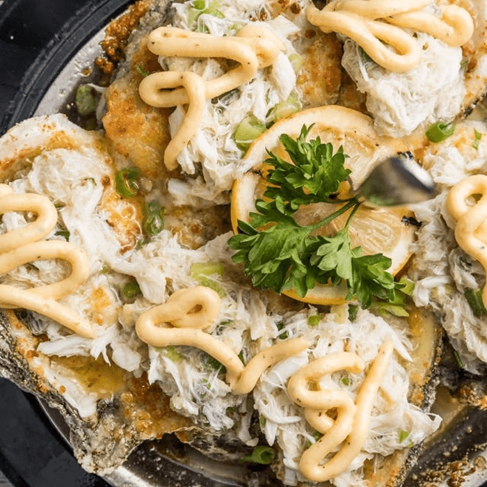 Gambino's Charbroiled Oysters with Crabmeat.