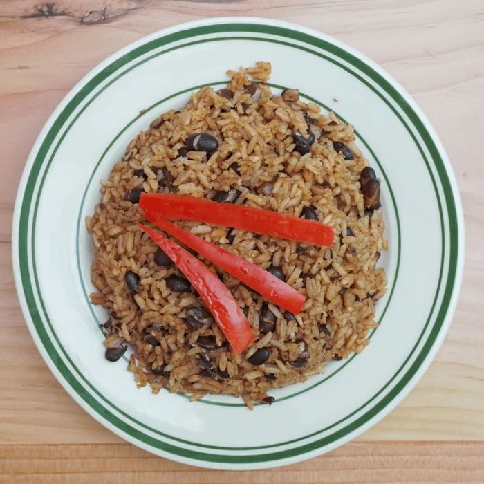 Moro De Gandules O Negro O Rojo / Mixed Rice with Beans or Red.