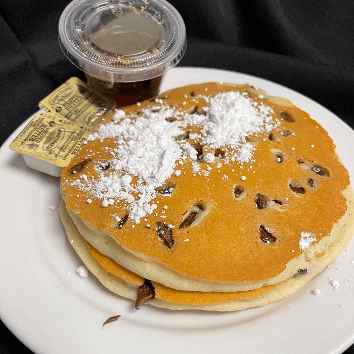 3 Chocolate Chips Pancake with Powdered Sugar.