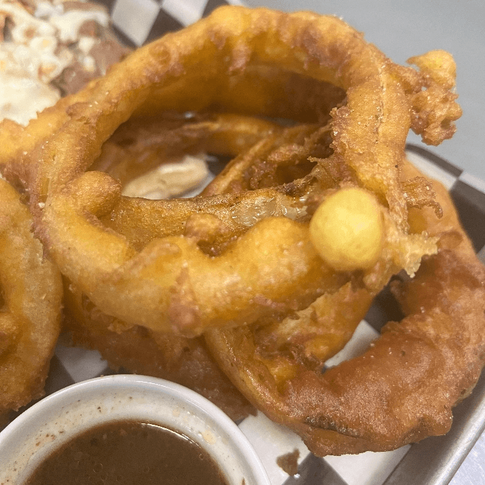 Hand Battered Onion Rings.