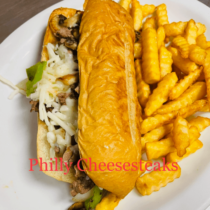 Philly Cheesesteak Sandwich with fries