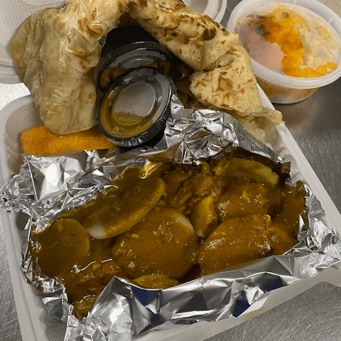 Guayana Curry Chicken Bus up Shut.