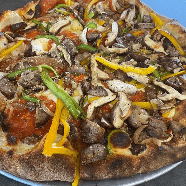 Deluxe Red Sauce Cauliflower Pizza.