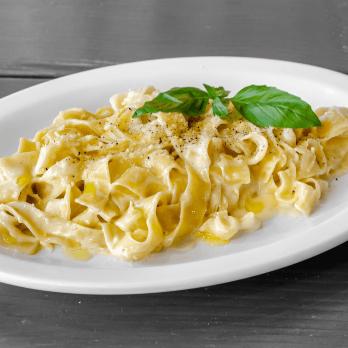 Homemade Fettuccine pasta with White sauce