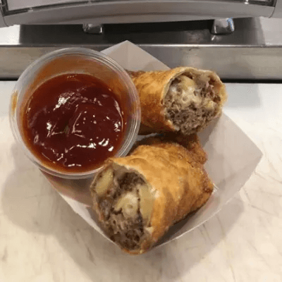 2 House Rolled Egg Rolls and Fries