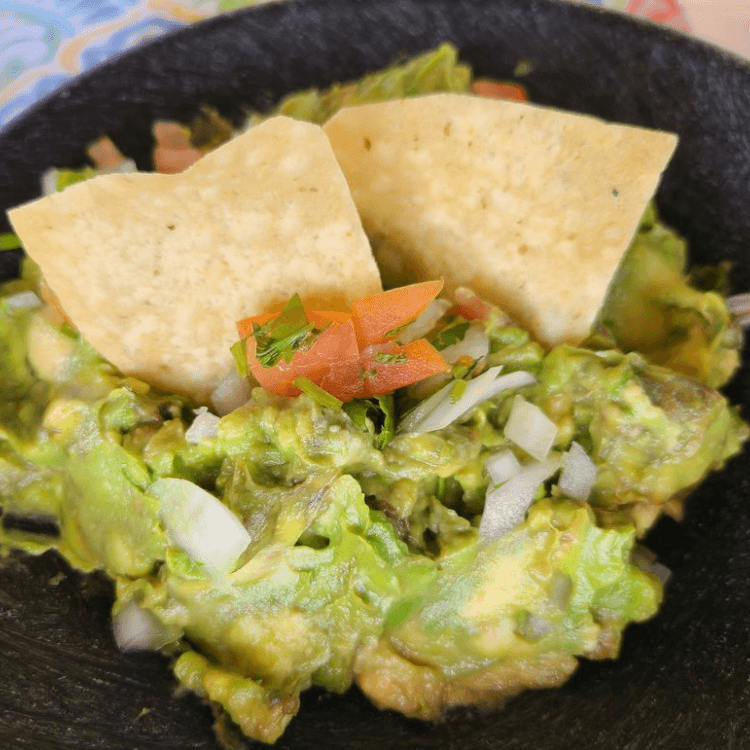 Small Guacamole Fresco; Cames with Chips and Salsa.