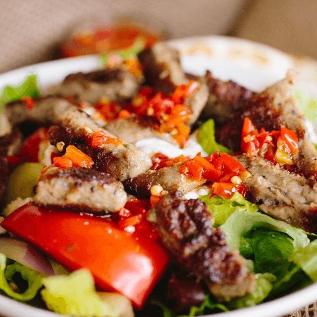 Classic Gyro Bowl. (Lettuce, Tomatoes, Onions, Cucumbers, & Tzatziki Sauce)