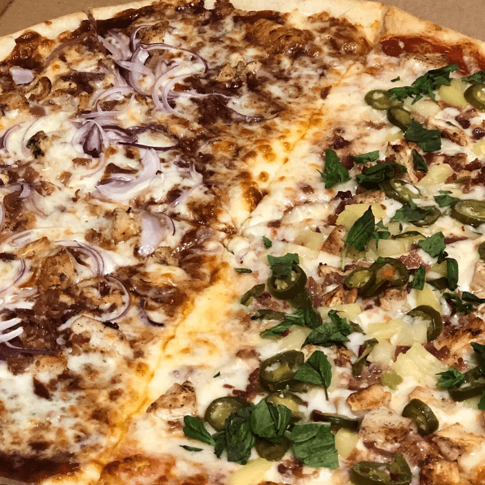 Spicy Hawaiian Chicken Pizza Slice.