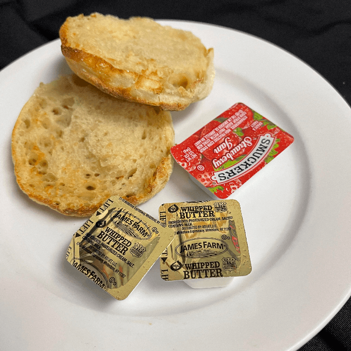english muffin with butter and jelly