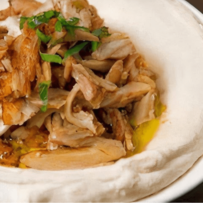 Chicken Shawarma Over Hummus