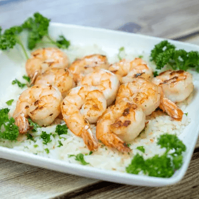 Grilled Shrimp Over Rice.