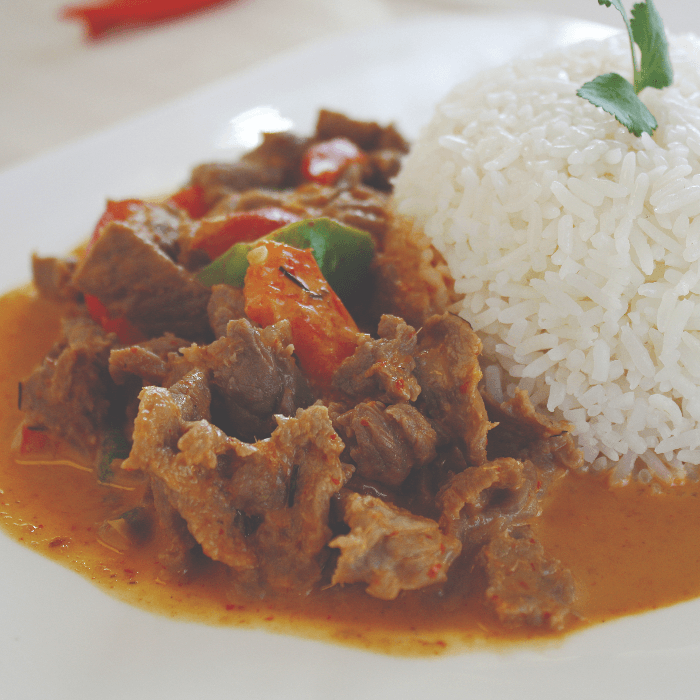 61. Red Panang Curry Over Rice.