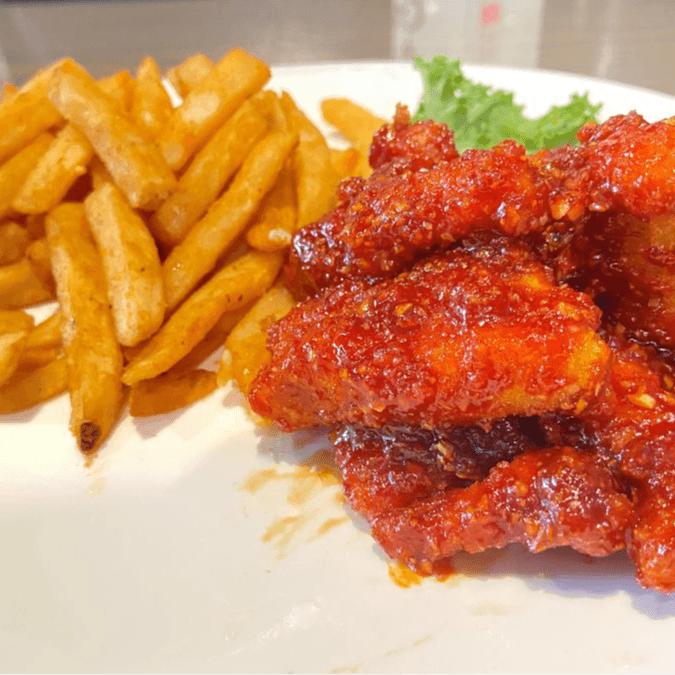 Spicy Korean Boneless Chicken w. French Fries.