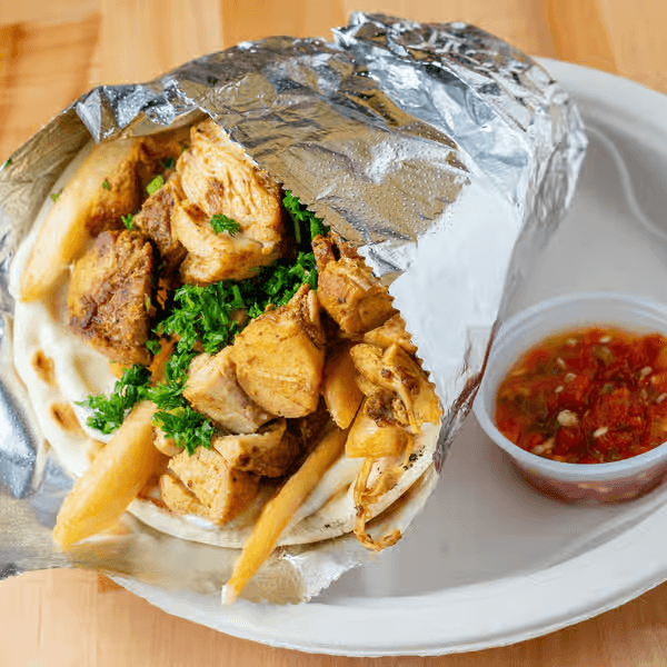 Chicken Shawarma Wrap. (Potatoes, Garlic Sauce, & Parsley)