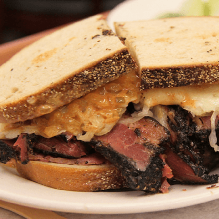 Grilled Pastrami Reuben with French Fries