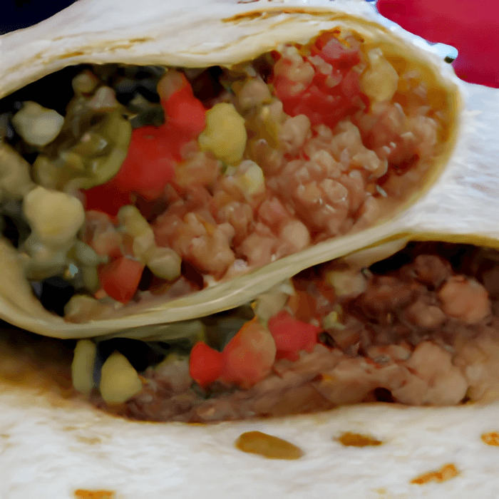 Ranchero Burrito ( COMES ASADA, ONIONS, MUSHROONS, AVOCADO & CHEESE)