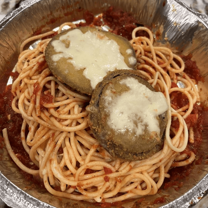 Eggplant Parmesan Over Spaghetti.