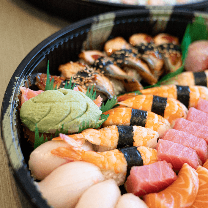 411. Sushi Sashimi and Roll Combination Tray (148 Pcs).
