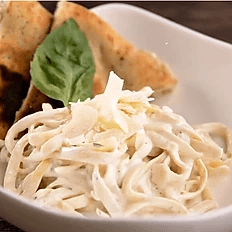 Fettuccine Alfredo, Pita, Shaved Parm.