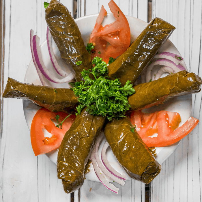 Grape Leaves (6 Pcs) served with Tzatziki Sauce 